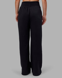 Woman wearing MVP Wide Leg Joggers - Black | Model:Neve | Size:S