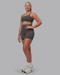Woman wearing Momentum Sports Bra D/DD/E - Dark Storm | Model:Lilli | Size:S