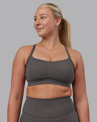 Woman wearing Momentum Sports Bra D/DD/E - Dark Storm | Model:Lilli | Size:S
