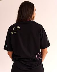 Woman wearing Mother's Day FLXCotton Oversize Tee - Black | Model:Jess | Size:S