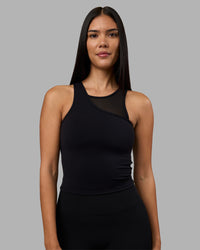 Woman wearing Motion Mesh Shelf Bra Tank - Black | Model:Rhiley | Size:S