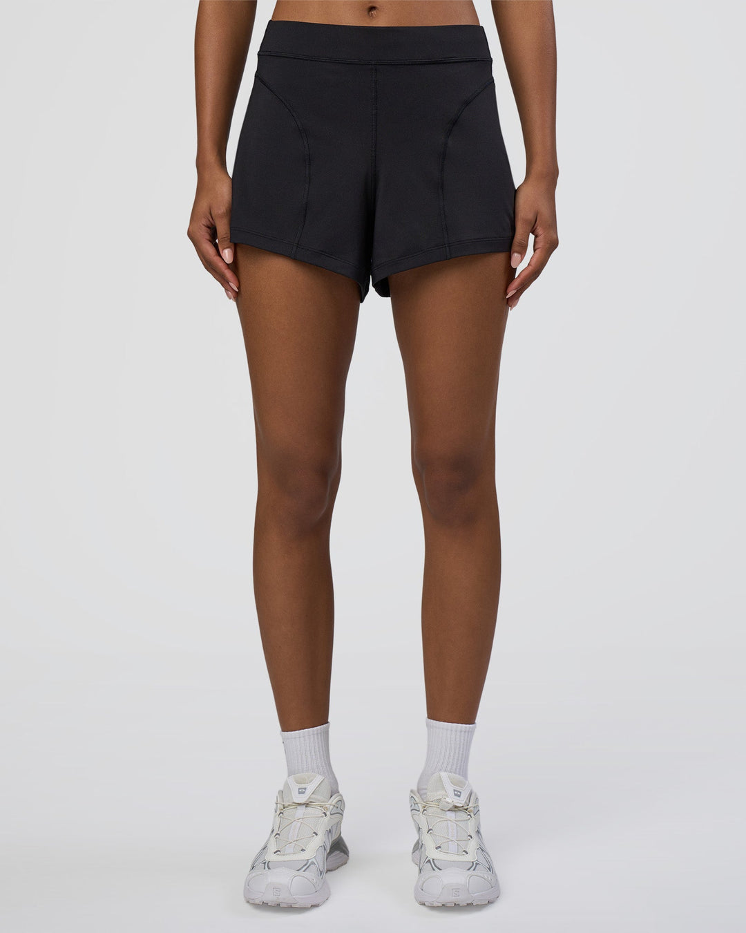 Woman wearing Movement CloudFLX 3" Short - Black | Model:Tomi | Size:S