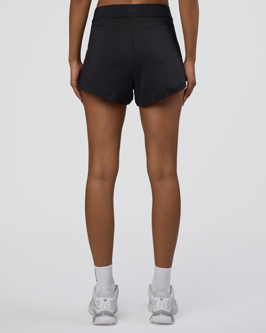 Woman wearing Movement CloudFLX 3" Short - Black | Model:Tomi | Size:S