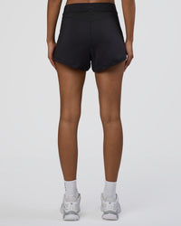 Woman wearing Movement CloudFLX 3" Short - Black | Model:Tomi | Size:S
