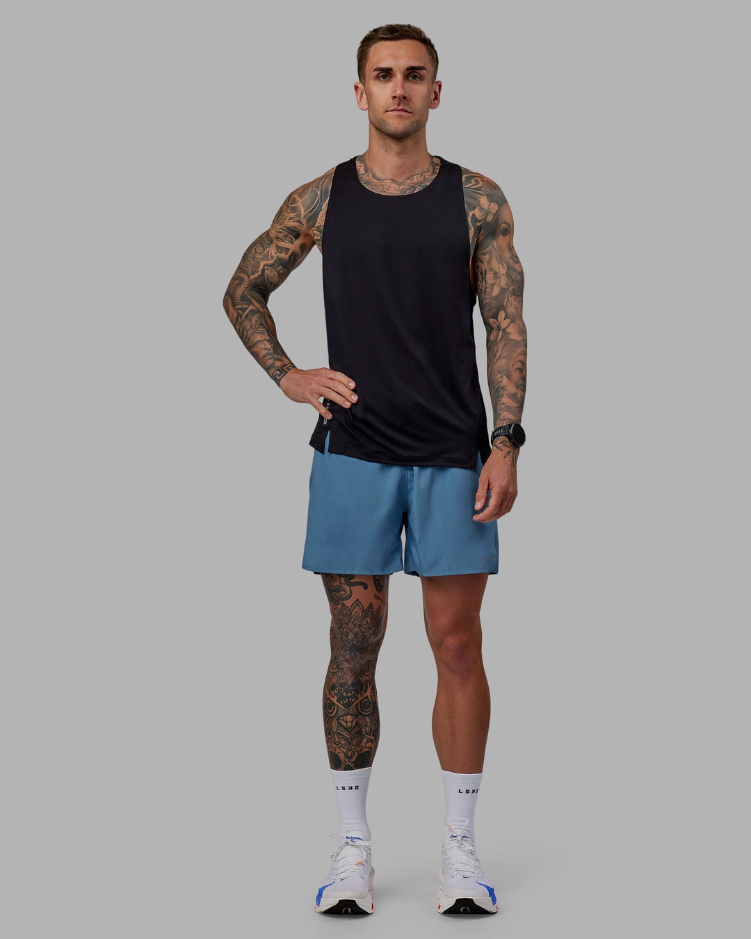 Man wearing Pace 5&quot; Lined Performance Shorts - Elemental Blue