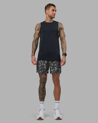 Man wearing Pace 5" Lined Running Short - Markings Dark Storm Print | Model:Tommy | Size:S