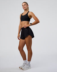 Woman wearing Pacer 3" Run Short - Black | Model:Emelia | Size:S