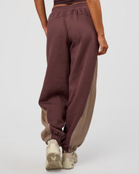 Woman wearing Power Play Stitch Up Fleece Sweat Pant - Cocoa Powder-Marshmallow | Model:Bianca | Size:S