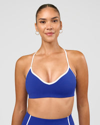 Woman wearing Power Sweetheart Sports Bra - Electric Indigo | Model:Rhiley | Size:S