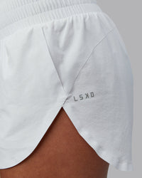 Woman wearing Power Train 2" Short in White | Model:Tylah | Size:S