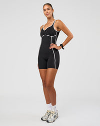 Woman wearing Power Ultra High-Rise 6" Short Pockets - Black | Model:Rhiley | Size:S