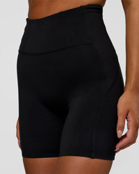 Woman wearing Progression Ultra High-Rise 6" Short - Black | Model:Kirstyn | Size:S