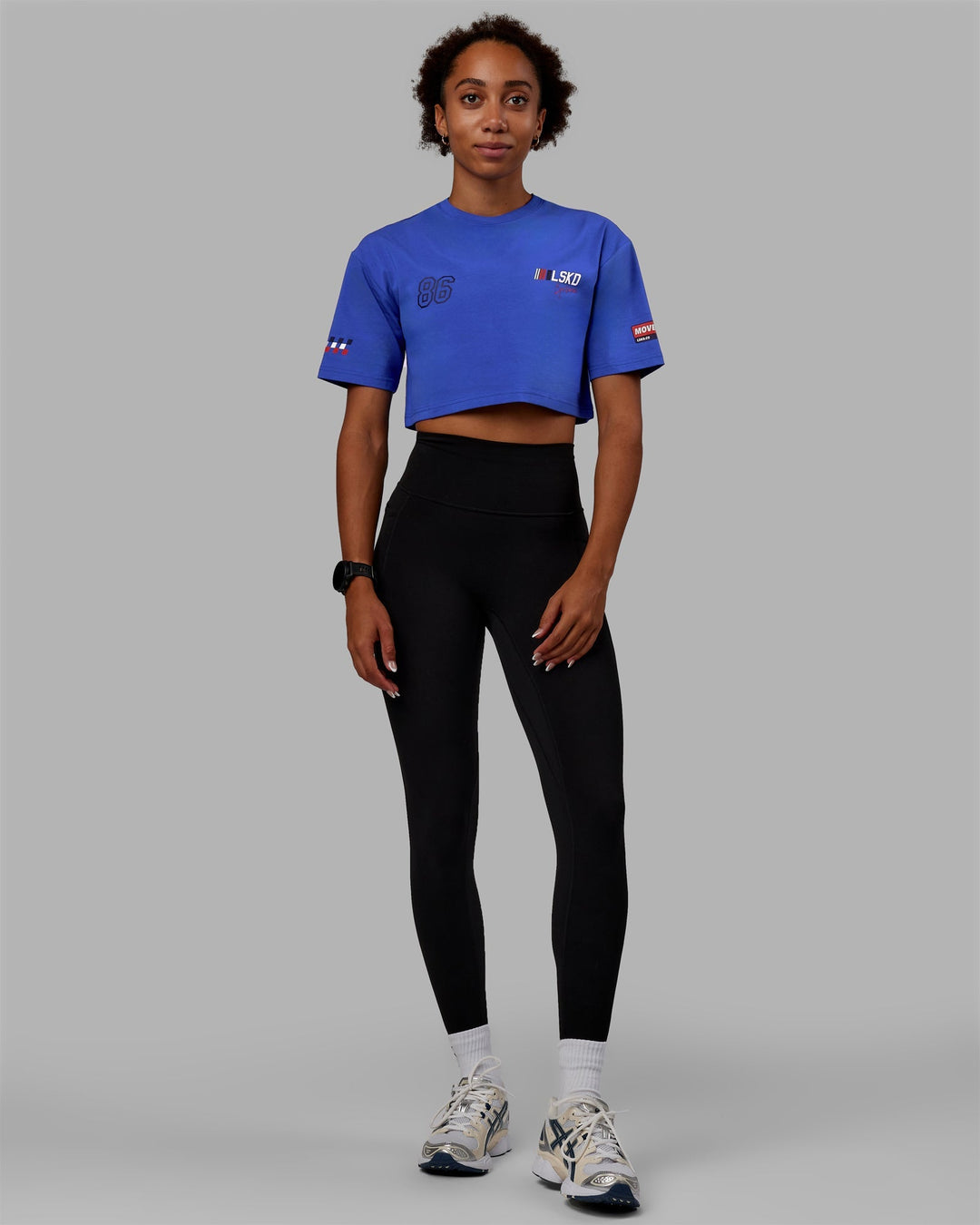 Woman wearing Redline FLXCotton Cropped Tee - Power Cobalt-White