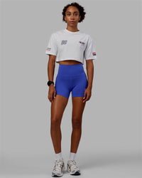 Woman wearing Redline FLXCotton Cropped Tee - White-Navy  Edit alt text