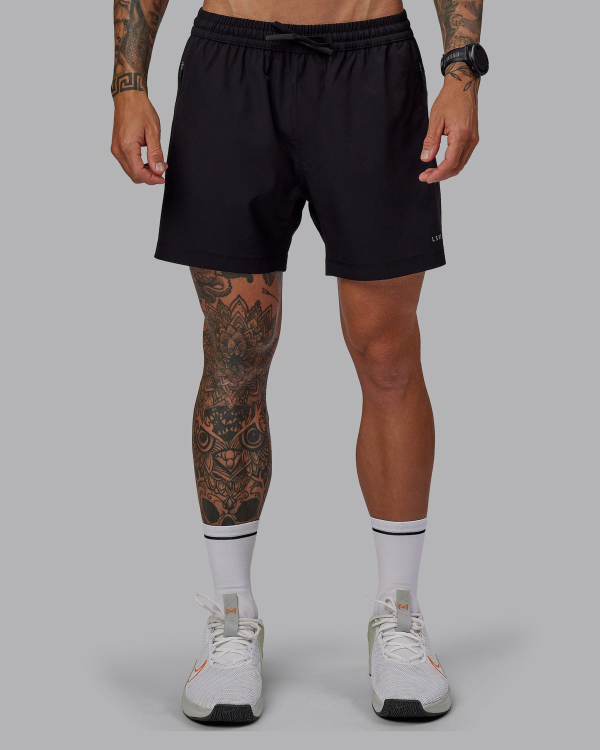 Man wearing Rep 5" Lined Performance Shorts in Black | Size:S - view 2
