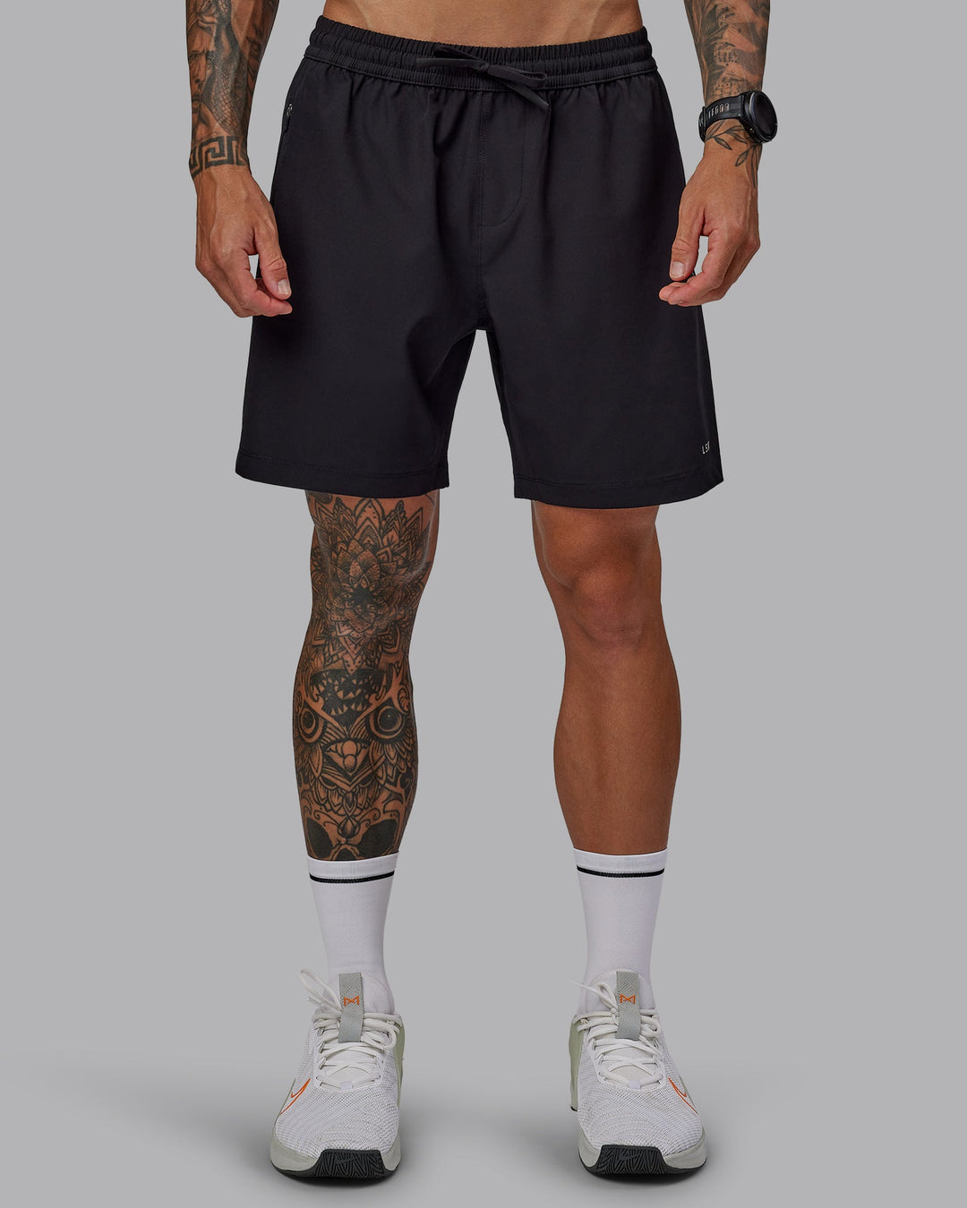 Man wearing Rep 7'' Performance Short in Black-White | Size:S