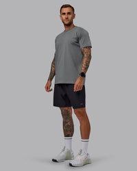 Man wearing Rep 7'' Performance Short in Black-White | Size:S
