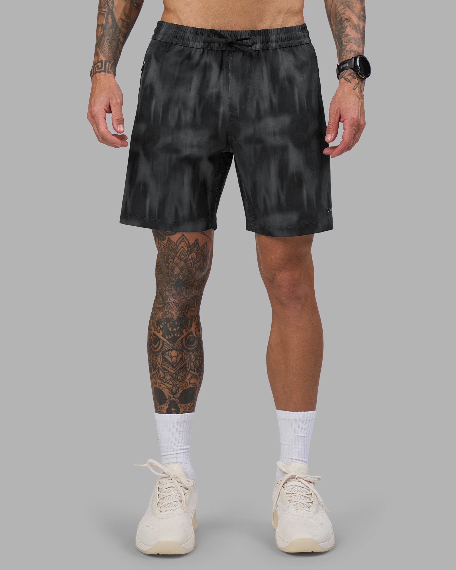 Man wearing Rep 7'' Performance Short - Lunar Glow Print | Model:Tommy | Size:S