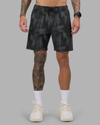 Man wearing Rep 7'' Performance Short - Lunar Glow Print | Model:Tommy | Size:S