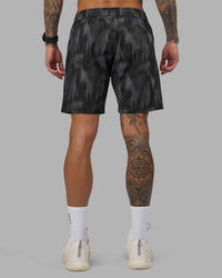 Man wearing Rep 7'' Performance Short - Lunar Glow Print | Model:Tommy | Size:S