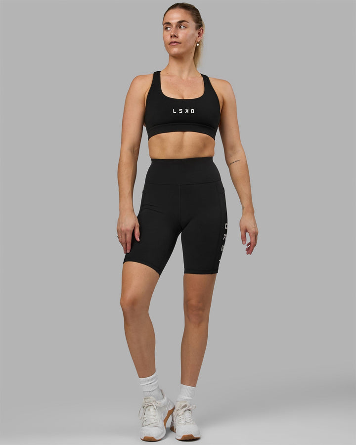 Woman wearing Rep Bike Shorts - Black-White
