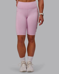 Woman wearing Rep Ultra High-Rise 9" Short Pockets - Marshmallow-Cherry Lacquer