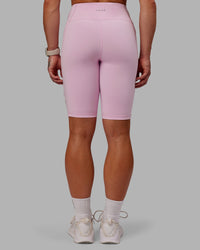 Woman wearing Rep Ultra High-Rise 9" Short Pockets - Marshmallow-Cherry Lacquer