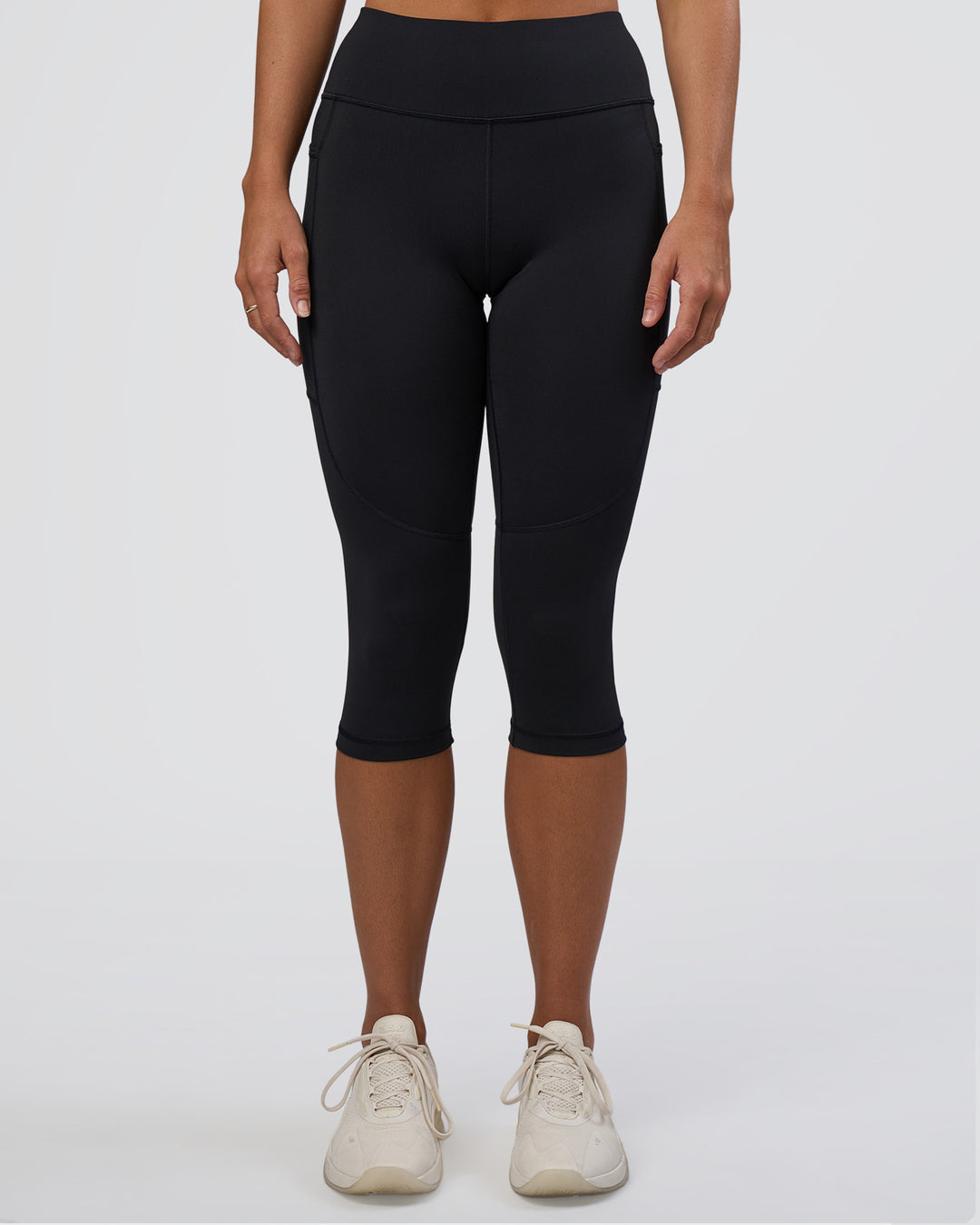 Woman wearing Rep Ultra High-Rise 3/4 Legging Pockets - Black-Black | Model:Amity | Size:S