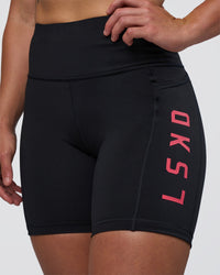 Woman wearing Rep Ultra High-Rise 6" Short Pockets - Black-Bright Raspberry | Model:Tenaya | Size:S