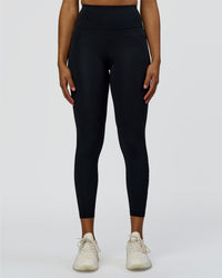 Woman wearing Rep Ultra High-Rise 7/8 Legging Pockets - Black-Palace Blue | Model:Rosie | Size:S