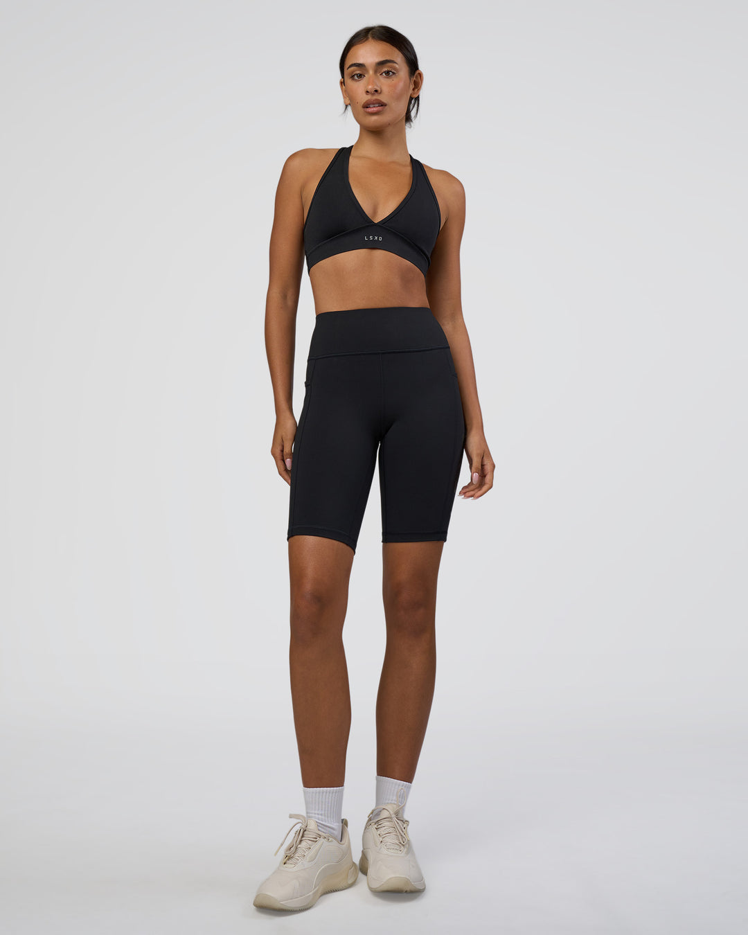 Woman wearing Rep Ultra High-Rise 9" Short Pockets - Black-Black | Model:Ruby | Size:S