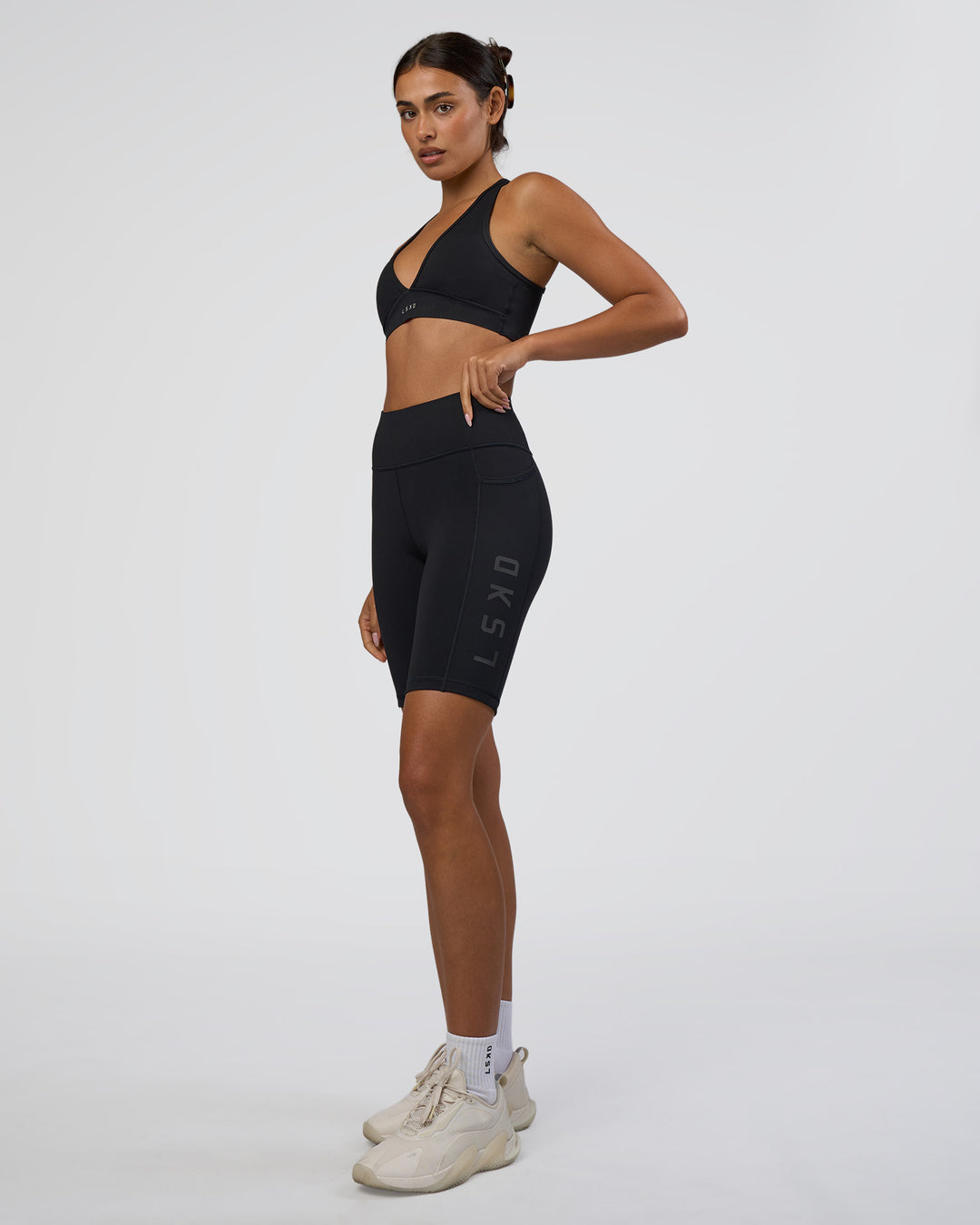 Woman wearing Rep Ultra High-Rise 9" Short Pockets - Black-Black | Model:Ruby | Size:S