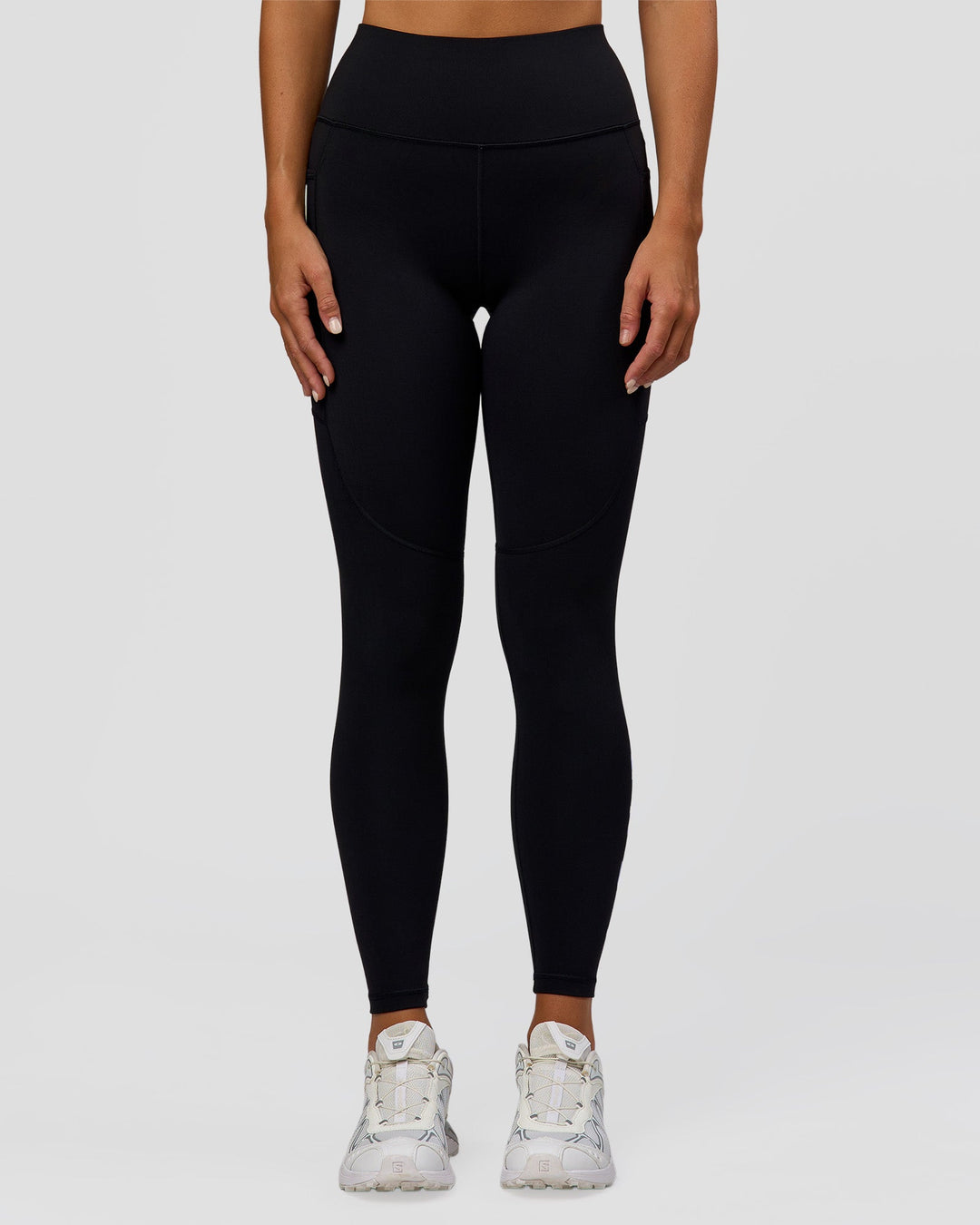 Woman wearing Rep Ultra High-Rise Full Length Legging Pockets - Black-Palace Blue | Model:Amity | Size:S