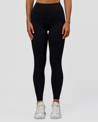 Woman wearing Rep Ultra High-Rise Full Length Legging Pockets - Black-Palace Blue | Model:Amity | Size:S