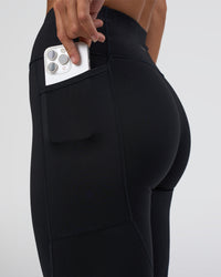 Woman wearing Rep Ultra High-Rise Full Length Legging Pockets - Black-Black | Model:Amity | Size:S