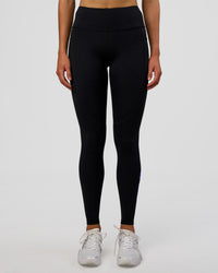 Woman wearing Rep Ultra High-Rise Full Length Legging Pockets - Black-Electric Indigo | Model:Evie | Size:S