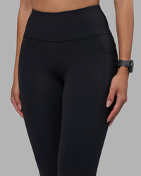 Woman wearing Rep Ultra High-Rise Full Length Legging Pockets - Black-Power Cobalt | Model:Rhiley | Size:S