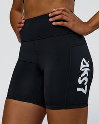 Woman wearing Rep Street Script Ultra High-Rise 6" Short Pockets - Black-White | Model:Rosie | Size:S