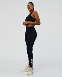 Woman wearing Rep Street Script Ultra High-Rise Full Length Legging Pockets - Black-White | Model:Rosie | Size:S