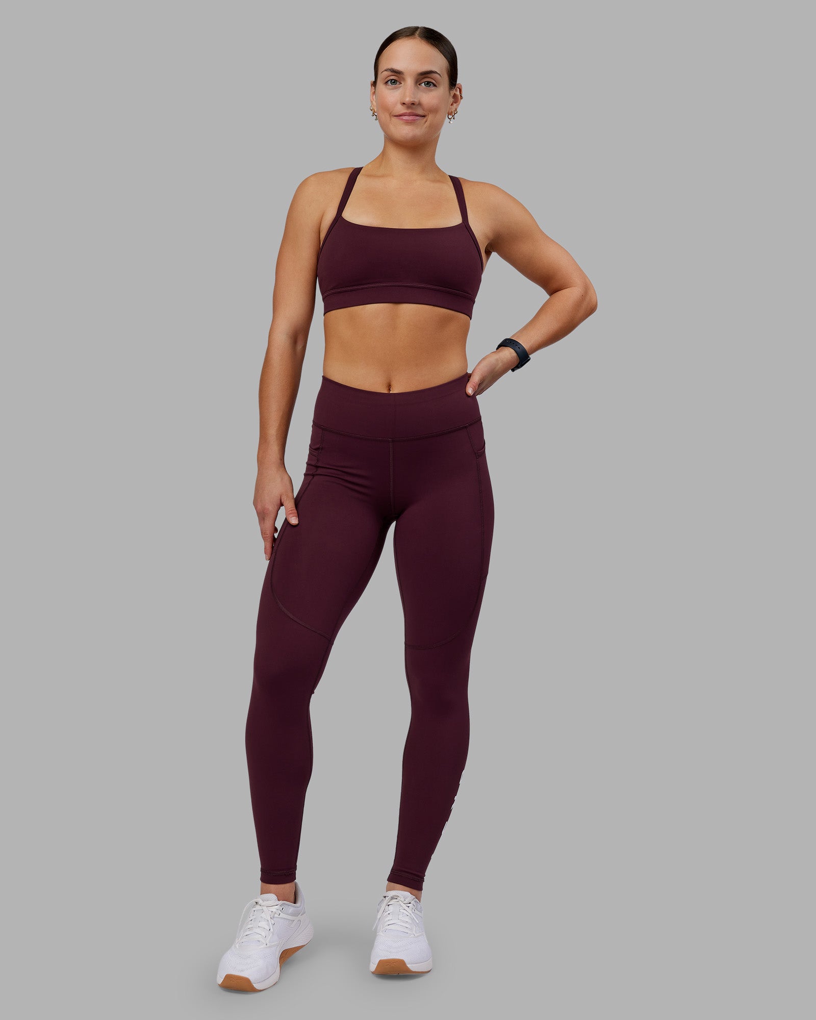Woman wearing Rep Ultra High-Rise Full Length Legging Pockets - Cherry Lacquer-White | Model:Keisha | Size:S