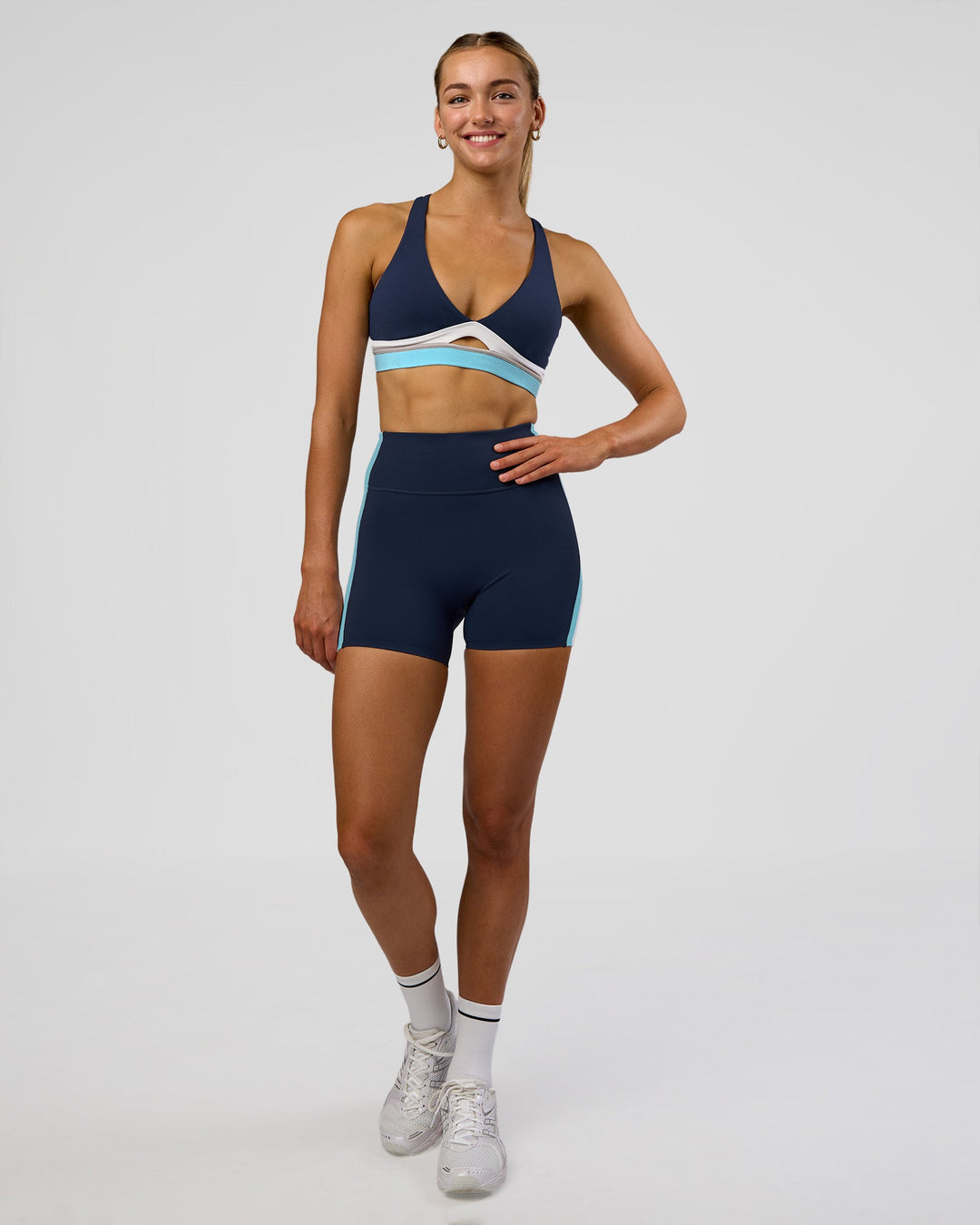 Woman wearing Revitalise Ultra High-Rise 4" Short - Future Navy-Multi | Model:Evie | Size:S