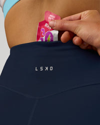 Woman wearing Revitalise Ultra High-Rise 4" Short - Future Navy-Multi | Model:Evie | Size:S