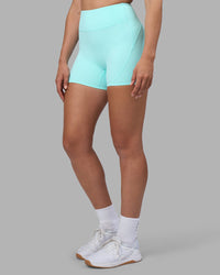 Woman wearing Rhythm Elixir Ultra High-Rise 4" Short - Island Paradise | Model:Sophie | Size:S