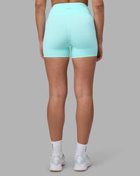 Woman wearing Rhythm Elixir Ultra High-Rise 4" Short - Island Paradise | Model:Sophie | Size:S