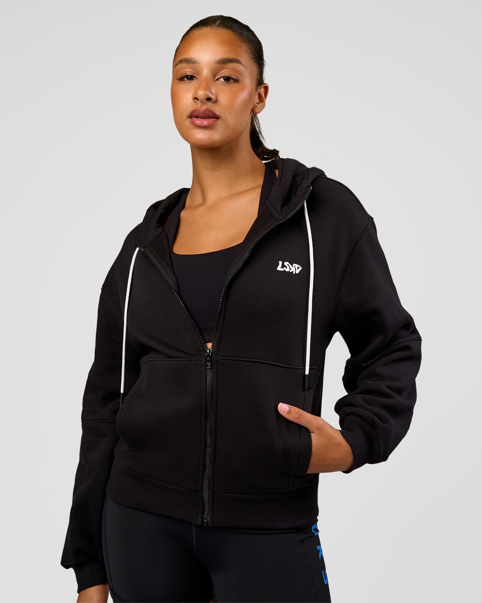 Woman wearing Run Fast Lift Heavy Hoodie - Black-White | Model:Rosie | Size:S