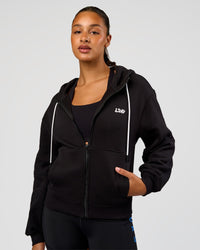 Woman wearing Run Fast Lift Heavy Hoodie - Black-White | Model:Rosie | Size:S
