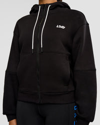 Woman wearing Run Fast Lift Heavy Hoodie - Black-White | Model:Rosie | Size:S