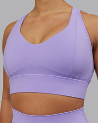 Woman wearing Sculpt Sports Bra - Violet Ray | Model:Ayla | Size:S