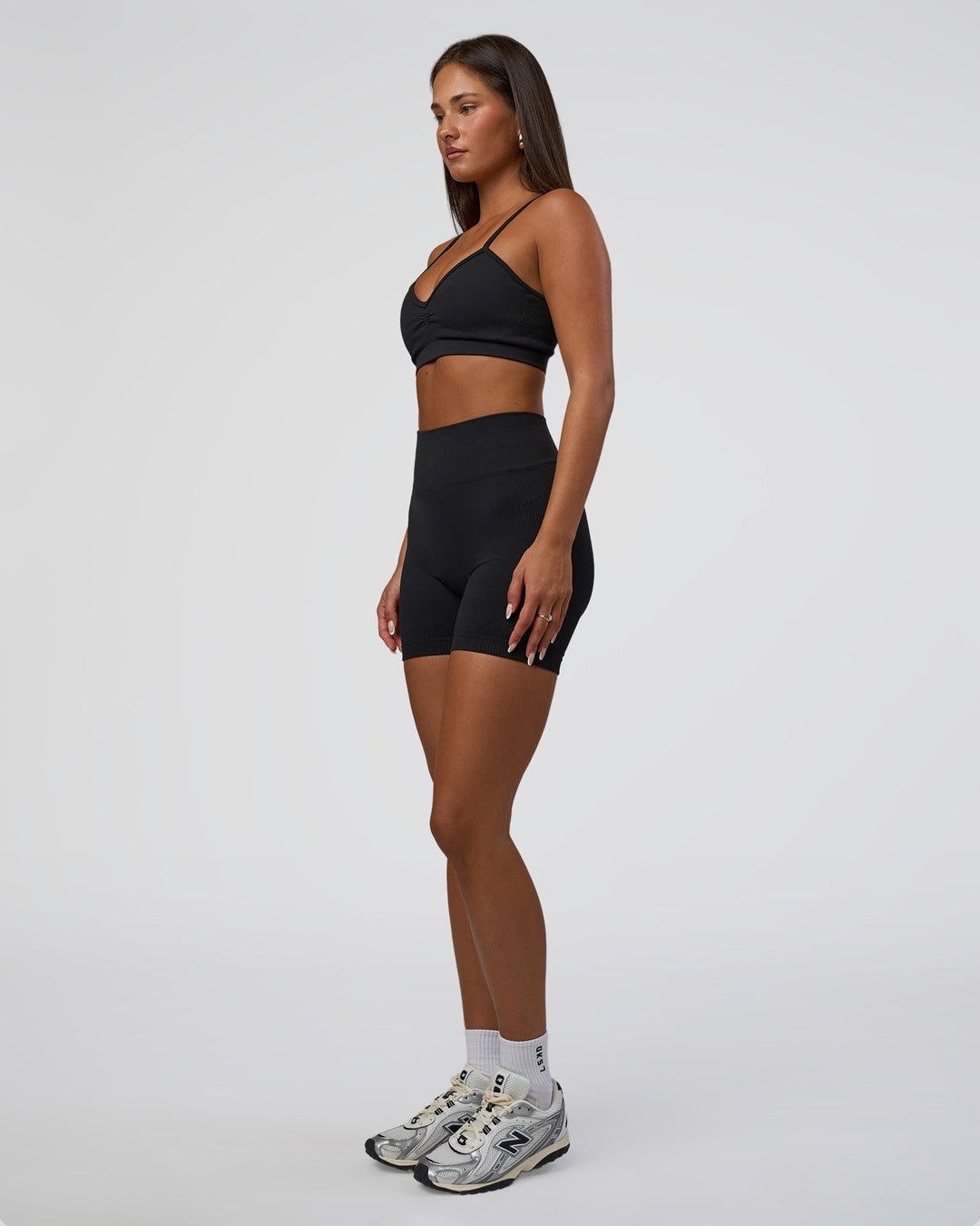 Woman wearing Spark Seamless Sports Bra - Black | Model:Bianca | Size:S