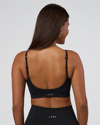 Woman wearing Spark Seamless Sports Bra - Black | Model:Bianca | Size:S